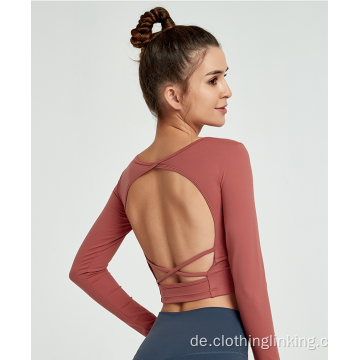 Sexy rückenfreie Yoga-Shirts öffnen den Rücken